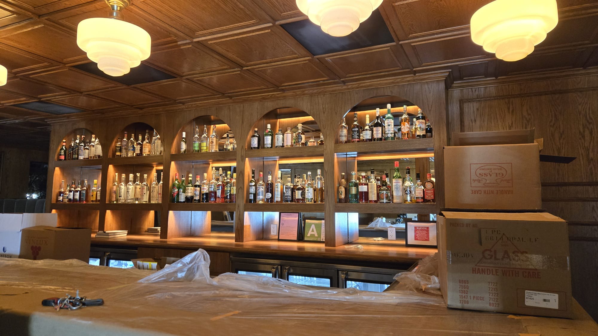 Finished bar walls, hallway, ceiling, after commercial interior painting at The Benjamin Hollywood in Los Angeles